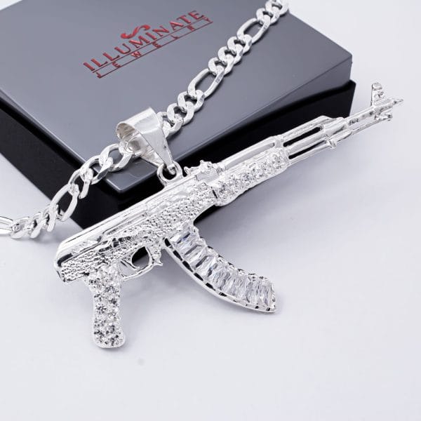 Dije Arma Larga y Zirconias Blancas