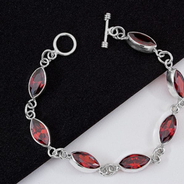 Pulsera 7 Semillas Zirconias Rojo
